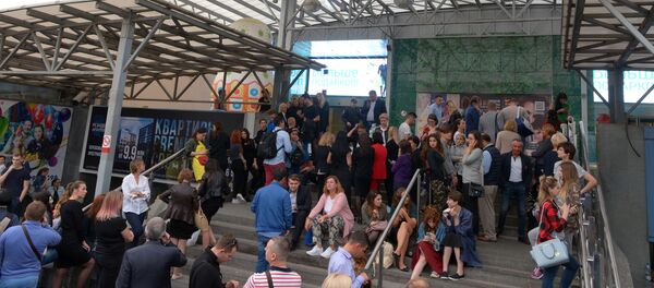 Visitors outside AFIMALL City shopping center. Security services verify memos on bombs being placed in buildings and shopping malls, Moscow Visitors outside AFIMALL City shopping center. Security services verify memos on bombs being placed in buildings and shopping malls, Moscow - Sputnik International