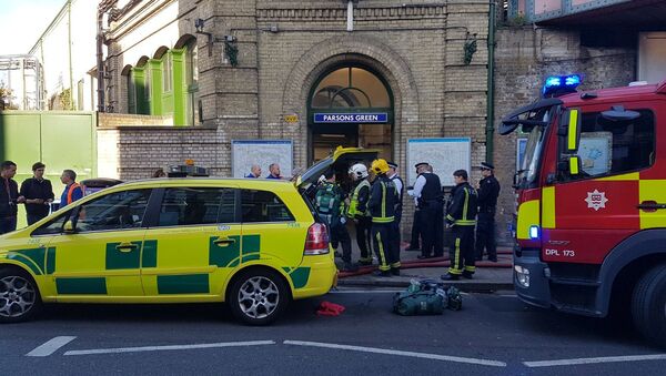 Emergency services attend the scene following a blast on an underground train at Parsons Green tube station in West London, Britain September 15, 2017, in this image taken from social media - Sputnik International