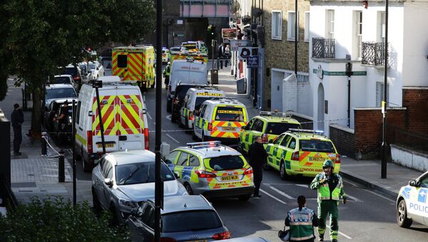 Police vehicles line the street near Parsons Green tube station in London, Britain September 15, 2017 - Sputnik International