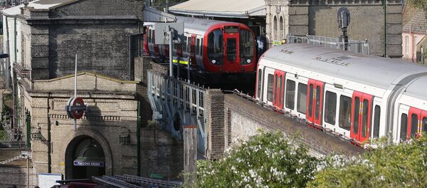 Members of the emergency services work alongside an underground tube train at a platform at Parsons Green underground tube station in west London on September 15, 2017, following an incident on an underground tube carriage at the station Members of the emergency services work alongside an underground tube train at a platform at Parsons Green underground tube station in west London on September 15, 2017, following an incident on an underground tube carriage at the station - Sputnik International