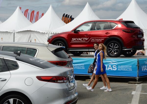 Cars and Girls: Highlights of the First Vladivostok International Autosalon - Sputnik International