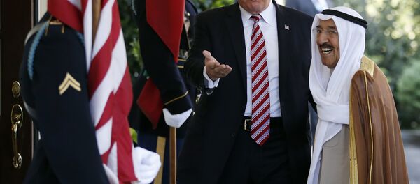 In this Thursday, Sept. 7, 2017 file photo, President Donald Trump, center, gestures as he greets the Amir of Kuwait Sheikh Sabah Al Ahmad Al Sabah as he arrives at the White House in Washington. Kuwait says it will expel North Korea's ambassador and four other diplomats from its embassy in Kuwait City. - Sputnik International