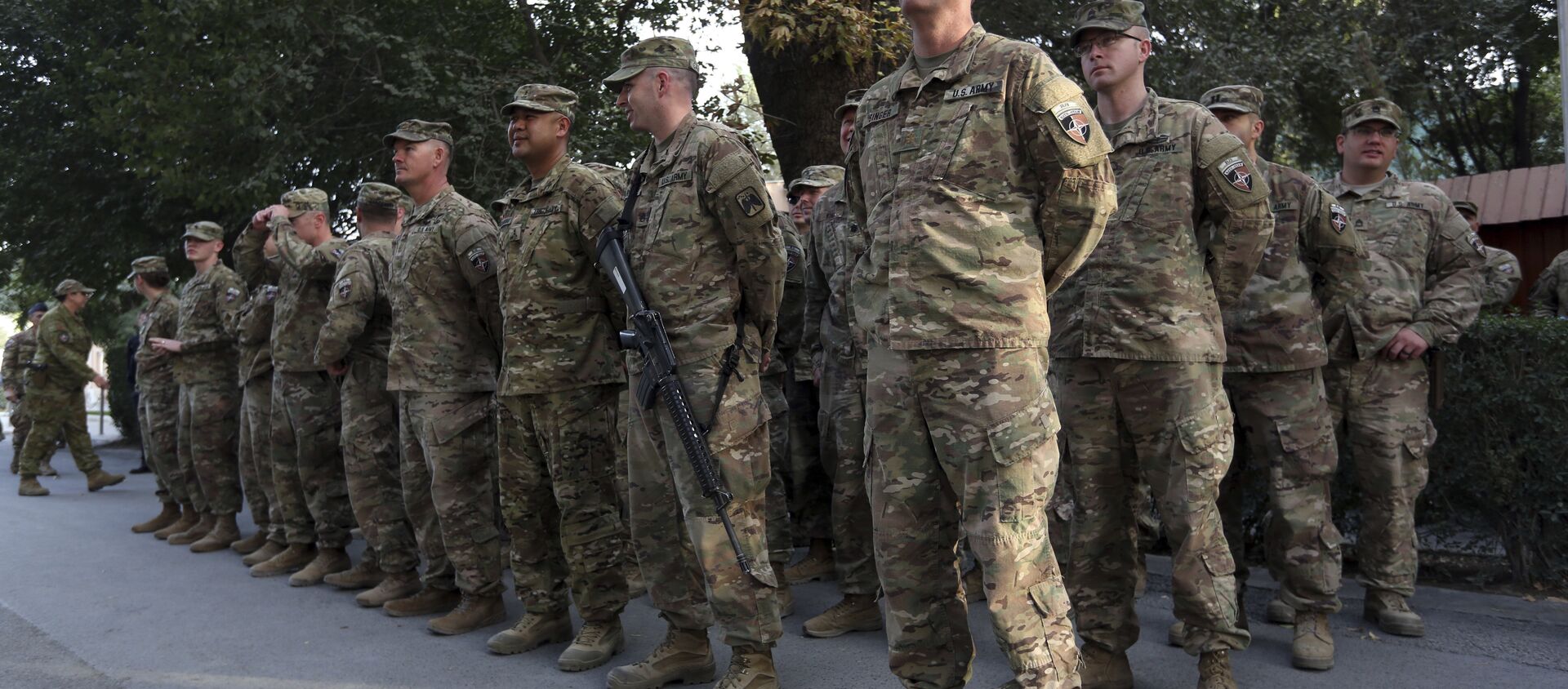 US and NATO soldiers take part in a ceremony to commemorate the Sept. 11, 2001, attack on the World Trade Center in New York, in Resolute Support 'Green Zone' headquarters of Kabul, Afghanistan, Monday, Sept. 11, 2017 - Sputnik International, 1920, 14.04.2021