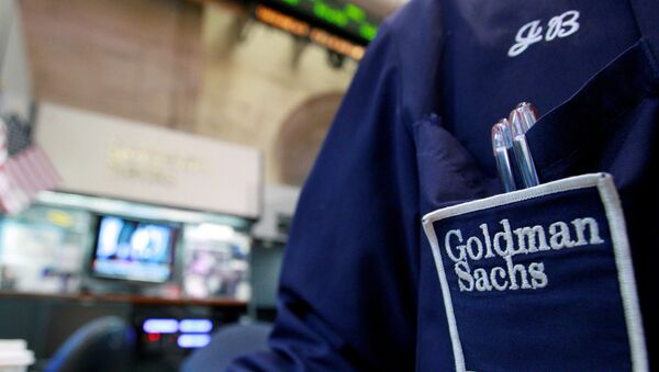 A trader works at the Goldman Sachs stall on the floor of the New York Stock Exchange, New York, U.S. (File) - Sputnik International
