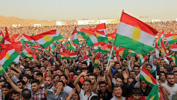 Kurdish people attend a rally to show their support for the upcoming September 25th independence referendum in Duhuk, Iraq September 16, 2017 - Sputnik International