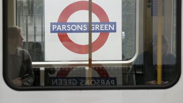 Passengers on a train at Parsons Green subway station after it was reopened following a terrorist attack on a train at the station yesterday in London, Saturday Sept. 16, 2017. - Sputnik International