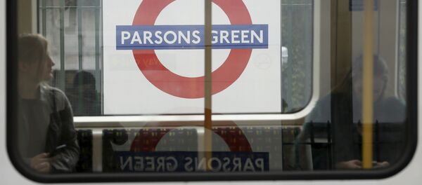 Passengers on a train at Parsons Green subway station after it was reopened following a terrorist attack on a train at the station yesterday in London, Saturday Sept. 16, 2017. Passengers on a train at Parsons Green subway station after it was reopened following a terrorist attack on a train at the station yesterday in London, Saturday Sept. 16, 2017. - Sputnik International