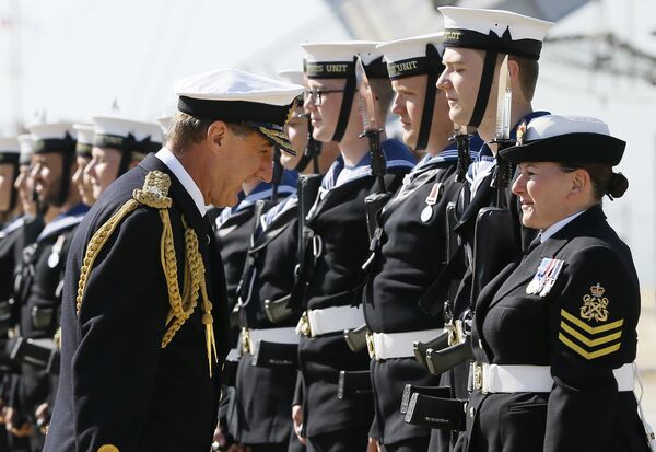 Admiral Sir George Zambellas, left, inspects the guard before he presents medals to Navy personnel involved in the UK's response to the Ebola crisis, in Portsmouth, England, Thursday, Sept. 10, 2015.  - Sputnik International