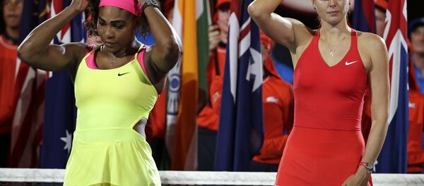 In this Saturday, Jan. 31, 2015 file photo, winner Serena Williams of the US, left, and runner-up Maria Sharapova of Russia, right, wait for the trophy presentation after the women's singles final at the Australian Open tennis championship in Melbourne, Australia. - Sputnik International