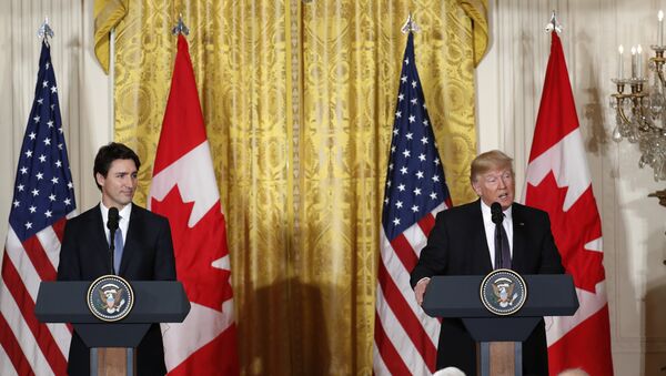 President Donald Trump and Canadian Prime Minister Justin Trudeau participate in a joint news conference in the East Room of the White House in Washington, Monday, Feb. 13, 2017. - Sputnik International