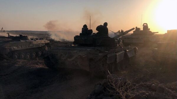 Tanks of the Syrian Army at combat positions in Deir ez-Zor Tanks of the Syrian Army at combat positions in Deir ez-Zor - Sputnik International