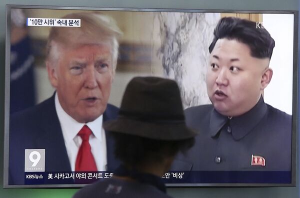A man watches a television screen showing U.S. President Donald Trump, left, and North Korean leader Kim Jong Un during a news program at the Seoul Train Station in Seoul, South Korea. (File) A man watches a television screen showing U.S. President Donald Trump, left, and North Korean leader Kim Jong Un during a news program at the Seoul Train Station in Seoul, South Korea. (File) - Sputnik International