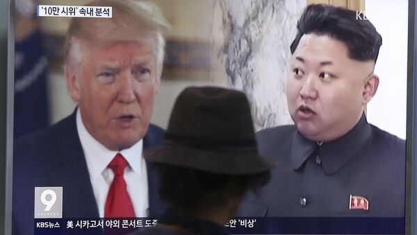 A man watches a television screen showing U.S. President Donald Trump, left, and North Korean leader Kim Jong Un during a news program at the Seoul Train Station in Seoul, South Korea. (File) - Sputnik International