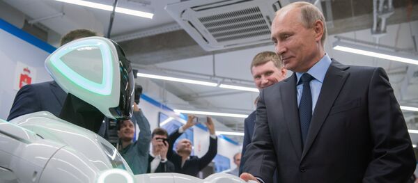 Russian President Vladimir Putin views a showroom of small and medium-size businesses engaged in 'digital economy' as he visits the ER-Telecom Holding in Perm Russian President Vladimir Putin views a showroom of small and medium-size businesses engaged in 'digital economy' as he visits the ER-Telecom Holding in Perm - Sputnik International