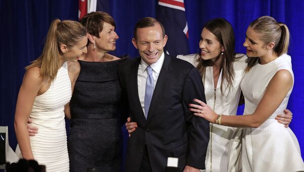 Australian opposition leader Tony Abbott, third left, and his daughters Frances, left, Louise, second right, and Bridget, right, and his wife Margaret, second left, come to the stage to celebrate his election victory in Sydney, Saturday, Sept. 7, 2013, following his win in Australia's national election. - Sputnik International