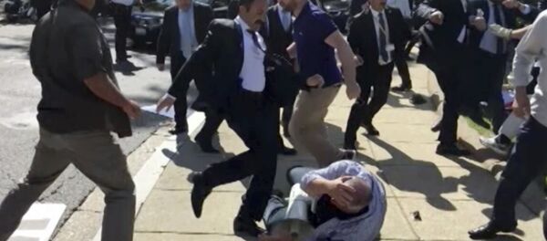 FILE- In this file frame grab from video provided by Voice of America, members of Turkish President Recep Tayyip Erdogan's security detail are shown violently reacting to peaceful protesters during Erdogan's trip last month to Washington - Sputnik International