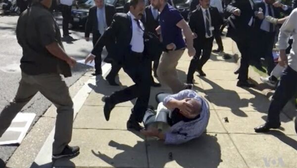 FILE- In this file frame grab from video provided by Voice of America, members of Turkish President Recep Tayyip Erdogan's security detail are shown violently reacting to peaceful protesters during Erdogan's trip last month to Washington - Sputnik International