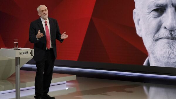 Labour leader Jeremy Corbyn, gestures. during a general election broadcast, in London, Monday May 29, 2017. ﻿Prime Minister Theresa May and Labour Party leader Jeremy Corbyn will face a live studio audience and a tough TV interviewer as the general election campaign moves to the airwaves. - Sputnik International