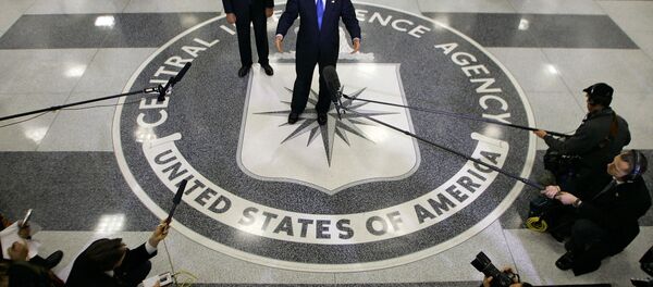 Former president Bush talks to reporters after he received an intelligence briefing at CIA Headquarters in Langley, Va., near Washington, Thursday, March 3, 2005. He is joined by Director of Central Intelligence Porter Goss. Former president Bush talks to reporters after he received an intelligence briefing at CIA Headquarters in Langley, Va., near Washington, Thursday, March 3, 2005. He is joined by Director of Central Intelligence Porter Goss. - Sputnik International