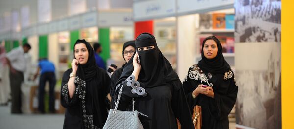 Saudi visitors attend the Riyadh International Book Fair on March 5, 2013 in the Saudi capital. Saudi visitors attend the Riyadh International Book Fair on March 5, 2013 in the Saudi capital. - Sputnik International