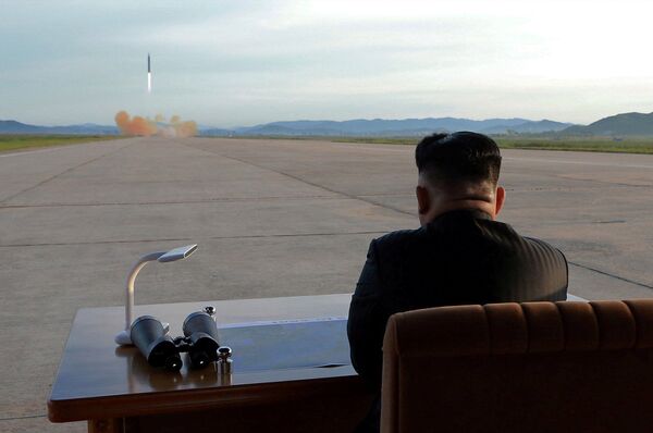North Korean leader Kim Jong Un watches the launch of a Hwasong-12 missile in this undated photo released by North Korea's Korean Central News Agency (KCNA) on September 16, 2017 North Korean leader Kim Jong Un watches the launch of a Hwasong-12 missile in this undated photo released by North Korea's Korean Central News Agency (KCNA) on September 16, 2017 - Sputnik International