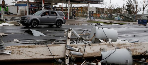 Damaged electrical installations are seen after the area was hit by Hurricane Maria en Guayama, Puerto Rico September 20, 2017 - Sputnik International