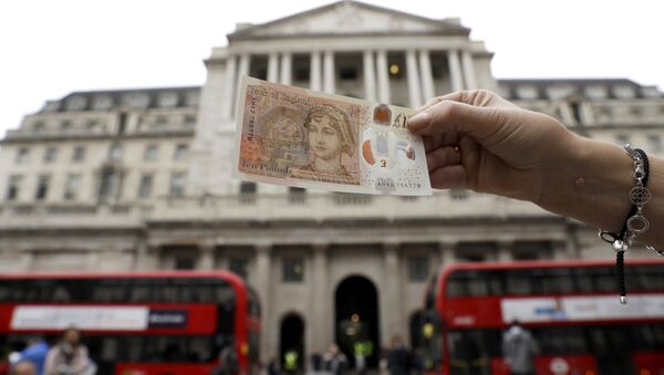 One of the new British 10 pound notes is posed for photographs outside the Bank of England in the City of London, Thursday, Sept. 14, 2017. - Sputnik International
