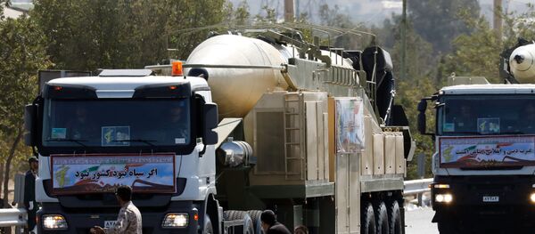 The new Iranian long range missile Khoramshahr (front) is displayed during the annual military parade marking the anniversary of the outbreak of its devastating 1980-1988 war with Saddam Hussein's Iraq, on September 22,2017 in Tehran - Sputnik International