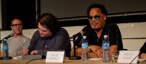 American illustrator and storyboard artist David Russell (R) American illustrator and storyboard artist David Russell (R) - Sputnik International