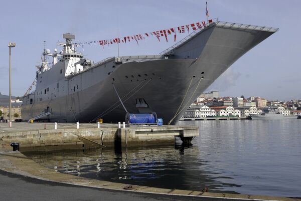 The Spanish Navy's strategic projection vessel Juan Carlos I is pictured during its giving ceremony at the Ferrol Naval Base, on September 30, 2010 - Sputnik International