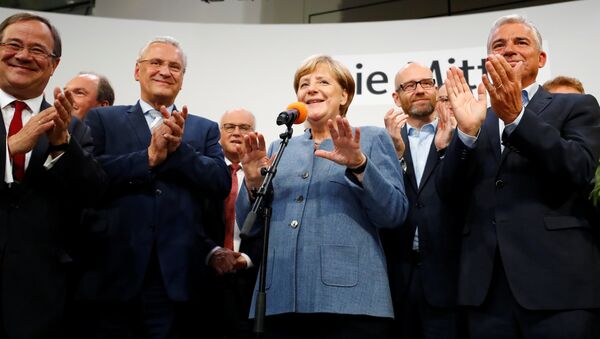 Christian Democratic Union CDU party leader and German Chancellor Angela Merkel reacts after winning the German general election (Bundestagswahl) in Berlin, Germany, September 24, 2017 - Sputnik International