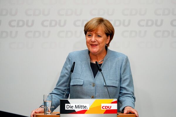 Christian Democratic Union CDU party leader and German Chancellor Angela Merkel addresses a news conference at the CDU party headquarters, a day after the general election (Bundestagswahl) in Berlin, Germany September 25, 2017 Christian Democratic Union CDU party leader and German Chancellor Angela Merkel addresses a news conference at the CDU party headquarters, a day after the general election (Bundestagswahl) in Berlin, Germany September 25, 2017 - Sputnik International