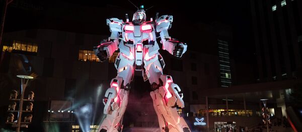 The new full-size standing statue RX-0 Unicorn Gundam from the Mobile Suit Gundam UC anime is unveiled at a press preview in Tokyo The new full-size standing statue RX-0 Unicorn Gundam from the Mobile Suit Gundam UC anime is unveiled at a press preview in Tokyo - Sputnik International