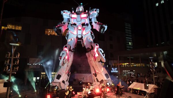 The new full-size standing statue RX-0 Unicorn Gundam from the Mobile Suit Gundam UC anime is unveiled at a press preview in Tokyo - Sputnik International