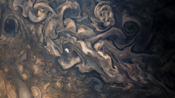 Jupiter's stormy atmosphere, photographed by Juno's JunoCam during the probe's eighth flyby. - Sputnik International