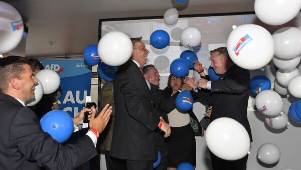AfD board members celebrate with baloons during the election party of the nationalist 'Alternative for Germany', AfD, in Berlin, Germany, Sunday, Sept. 24, 2017, after the polling stations for the German parliament elections had been closed - Sputnik International