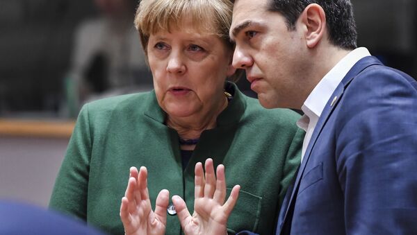 Greek Prime Minister Alexis Tsipras, right, speaks with German Chancellor Angela Merkel during a round table meeting at an EU summit in Brussels on Friday, March 10, 2017. - Sputnik International