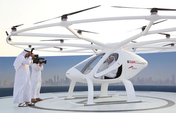 Dubai Crown Prince Sheikh Hamdan bin Mohammed bin Rashid Al Maktoum is seen inside the flying taxi in Dubai, United Arab Emirates September 25, 2017 - Sputnik International