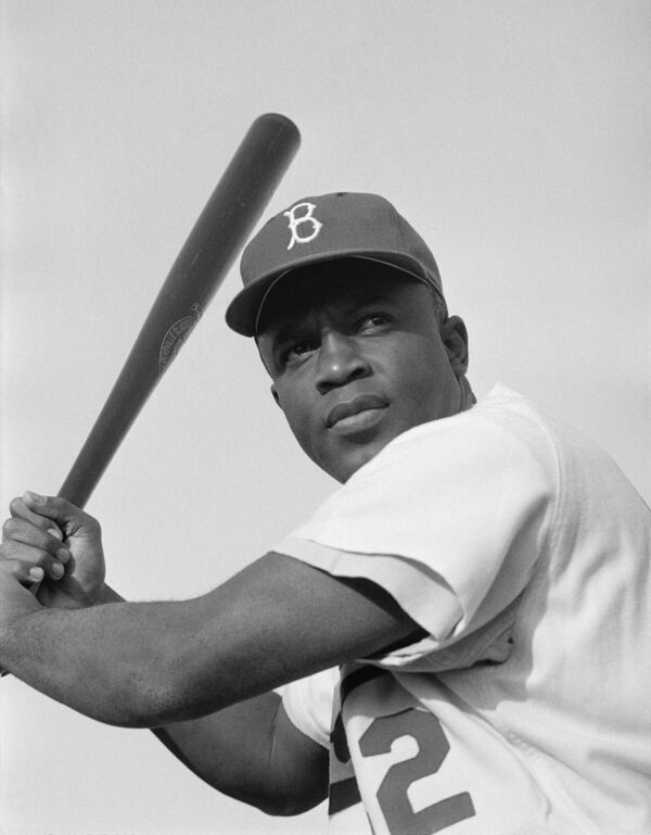 Jackie Robinson of the Brooklyn Dodgers, posed and ready to swing. (File) Jackie Robinson of the Brooklyn Dodgers, posed and ready to swing. (File) - Sputnik International