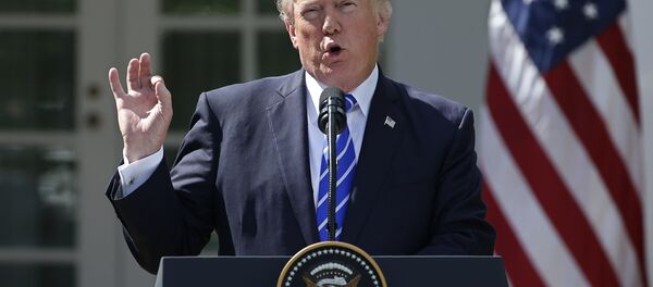 President Trump speaks as he holds a joint news conference with Spanish Prime Minister Rajoy in the Rose Garden at the White House in Washington - Sputnik International