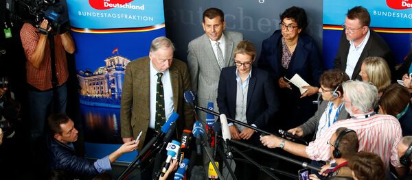 Anti-immigration party Alternative fuer Deutschland AfD top candidates Alice Weidel and Alexander Gauland address a news conference before a get together for their first parliamentary meeting in Berlin, Germany September 26, 2017 Anti-immigration party Alternative fuer Deutschland AfD top candidates Alice Weidel and Alexander Gauland address a news conference before a get together for their first parliamentary meeting in Berlin, Germany September 26, 2017 - Sputnik International