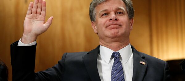 FBI Director Christopher Wray is sworn in to testify before a Senate Committee on Homeland Security and Governmental Affairs during a hearing on Threats to the homeland on Capitol Hill in Washington, US, September 27, 2017. FBI Director Christopher Wray is sworn in to testify before a Senate Committee on Homeland Security and Governmental Affairs during a hearing on Threats to the homeland on Capitol Hill in Washington, US, September 27, 2017. - Sputnik International