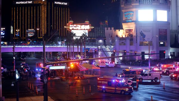 Las Vegas Metro Police and medical workers stage in the intersection of Tropicana Avenue and Las Vegas Boulevard South after a mass shooting at a music festival on the Las Vegas Strip in Las Vegas, Nevada, U.S. October 1, 2017 - Sputnik International