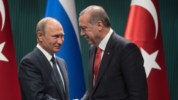 Russian President Vladimir Putin and Turkish President Recep Tayyip Erdogan, right, at a news conference after talks in Ankara on September 28, 2017 - Sputnik International