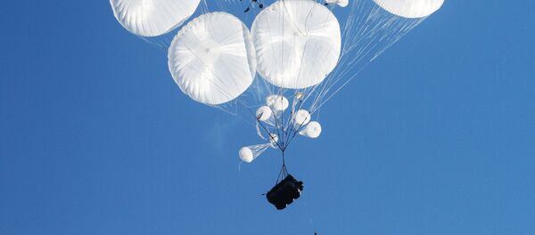 Airborne combat vehicles air dropped during the joint battalion tactical exercise of airborne troops from Russia, Belarus and Serbia at Rayevsky military base outside Novorossiysk - Sputnik International