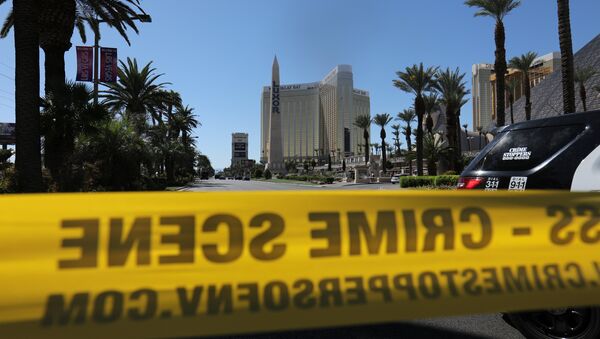 Police crime scene tape marks a perimeter outside the Luxor Las Vegas hotel and the Mandalay Bay Resort and Casino, following a mass shooting at the Route 91 Festival in Las Vegas, Nevada, U.S., October 2, 2017. - Sputnik International