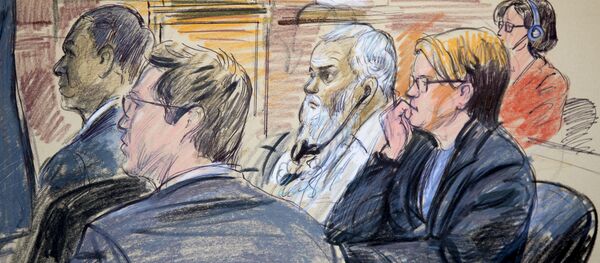 This courtroom sketch shows Ahmed Abu Khattala, third from right, listening to an interpreter through earphones during the opening statement by his defense attorney Jeffery Robinson in federal court in Washington Monday, Oct. 2, 2017. Khattala, the suspected mastermind of the 2012 attacks on a diplomatic compound in Benghazi, Libya, that killed four Americans, is on trial. Also depicted are members of the defense team Cole Lutermilch, left, and Michelle Peterson, second from right. - Sputnik International