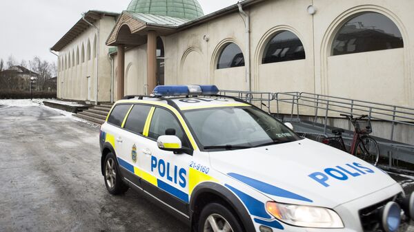 (File) A police car is parked in front of a mosque in Uppsala, Sweden, 1 January 2015 - Sputnik International