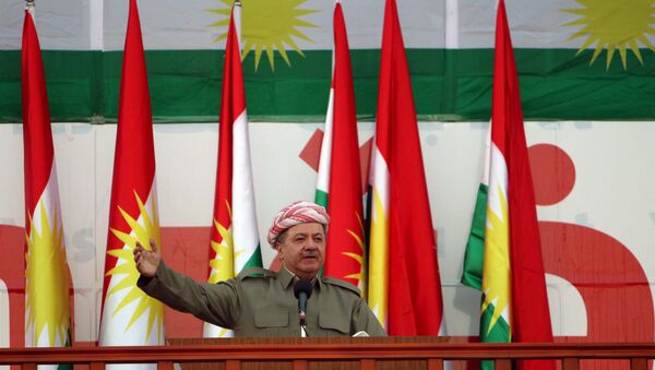 Iraqi Kurdish president Masoud Barzani salutes the crowd while attending a rally that shows the support for the upcoming September 25th independence referendum in Erbil, Iraq September 22, 2017. - Sputnik International