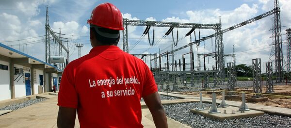 An employee of the Venezuelan national electricity company is pictured inside an electric plant in San Fernando de Apure (southern Venezuela) on October 02, 2008 An employee of the Venezuelan national electricity company is pictured inside an electric plant in San Fernando de Apure (southern Venezuela) on October 02, 2008 - Sputnik International